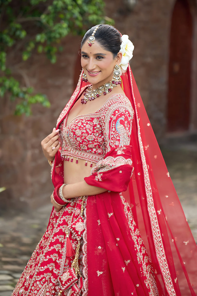 Crimson Royale – Red Bridal Lehenga with Intricate Silver Zari Embroidery