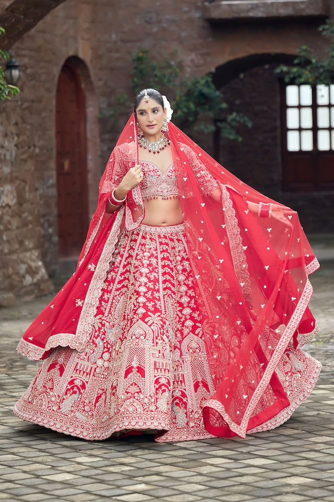Crimson Royale – Red Bridal Lehenga with Intricate Silver Zari Embroidery