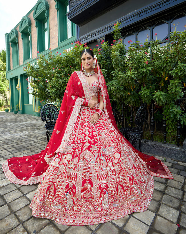 Crimson Royale – Red Bridal Lehenga with Intricate Silver Zari Embroidery