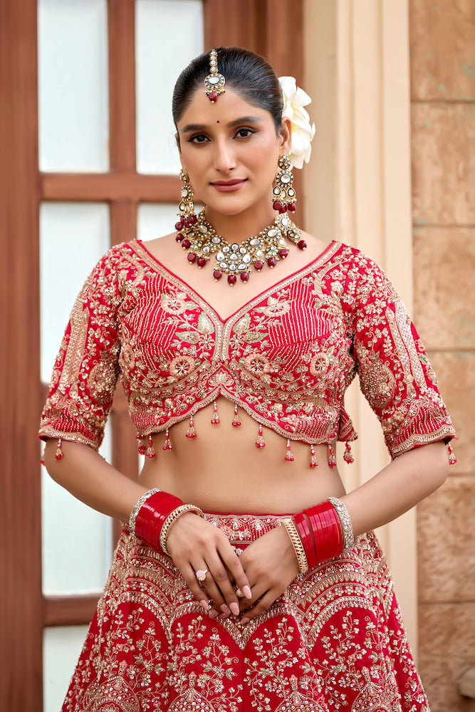 Scarlet Symphony Red Bridal Lehenga Choli with Exquisite Silver Embroidery