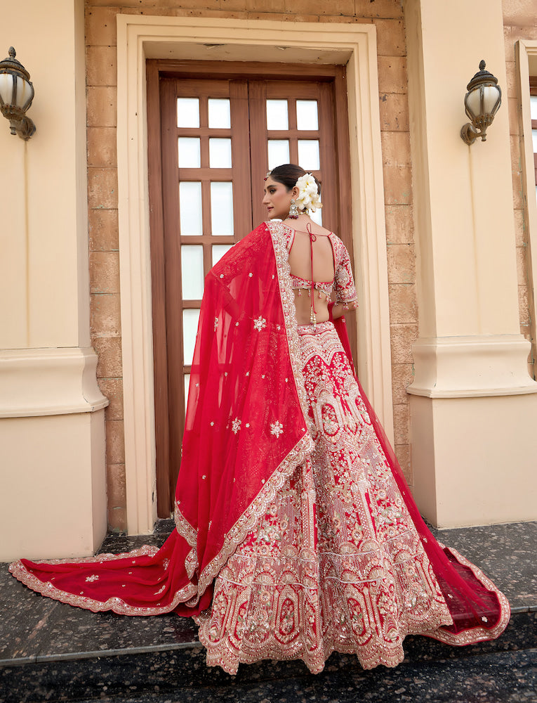 Scarlet Symphony Red Bridal Lehenga Choli with Exquisite Silver Embroidery