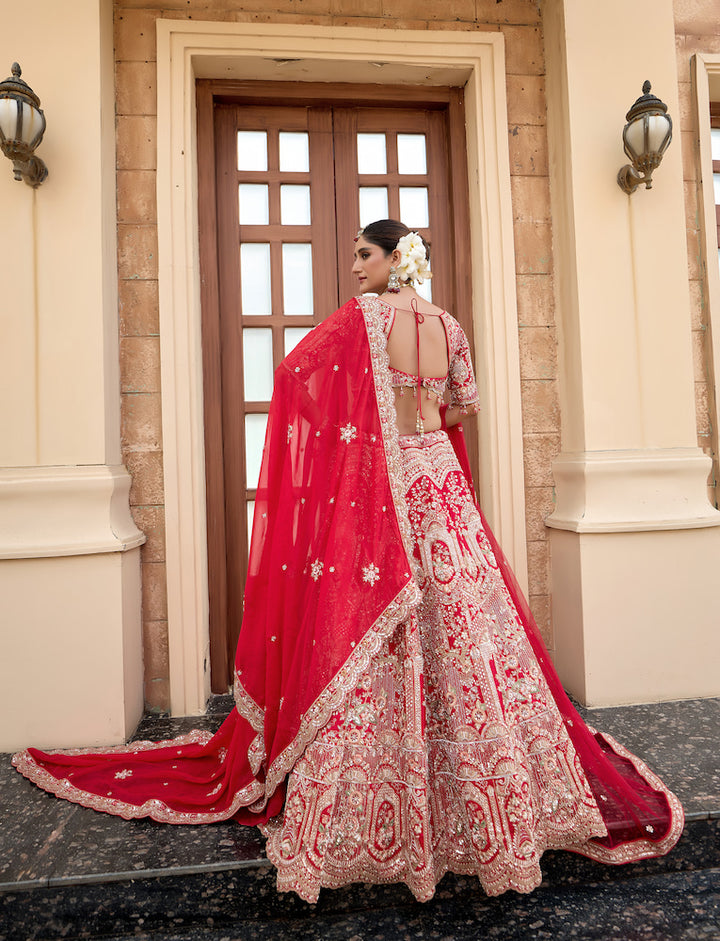 Scarlet Symphony Red Bridal Lehenga Choli with Exquisite Silver Embroidery