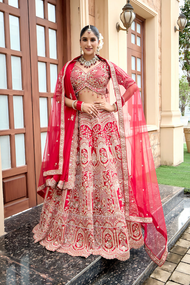 Scarlet Symphony Red Bridal Lehenga Choli with Exquisite Silver Embroidery