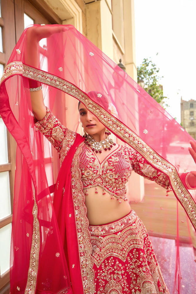 Scarlet Symphony Red Bridal Lehenga Choli with Exquisite Silver Embroidery
