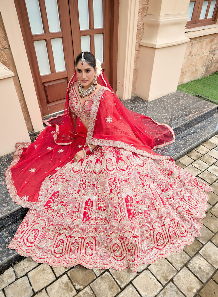 Scarlet Symphony Red Bridal Lehenga Choli with Exquisite Silver Embroidery