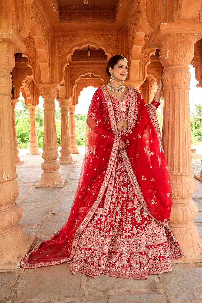 Shahi Afsana Crimson Red Bridal Lehenga Choli with Intricate Golden Embroidery