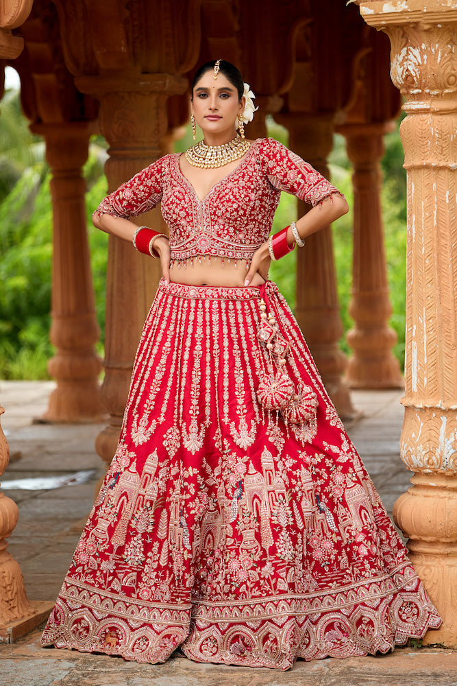 Rang Mahal Vermilion Red Bridal Lehenga Choli with Intricate Silver Embroidery