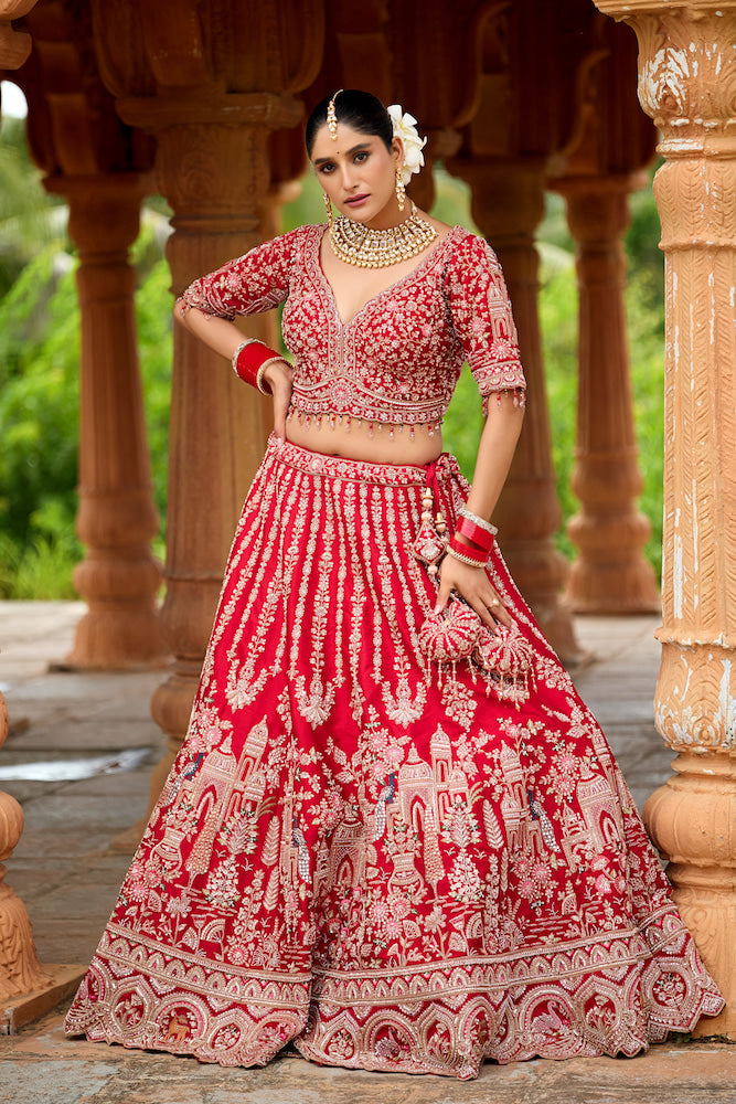 Rang Mahal Vermilion Red Bridal Lehenga Choli with Intricate Silver Embroidery