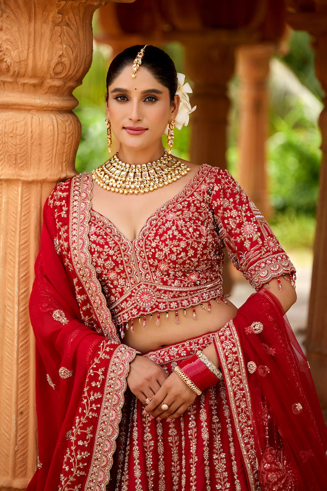Rang Mahal Vermilion Red Bridal Lehenga Choli with Intricate Silver Embroidery