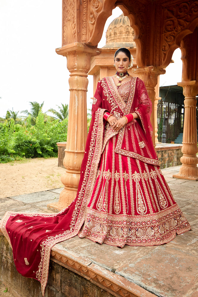 Meher-e-Riwaaz Wine Red Bridal Lehenga with Intricate Golden Embroidery