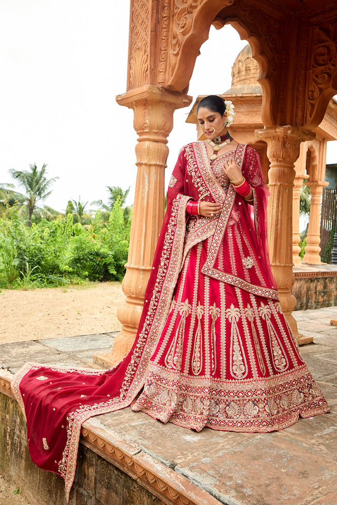 Meher-e-Riwaaz Wine Red Bridal Lehenga with Intricate Golden Embroidery