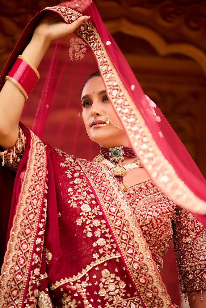 Meher-e-Riwaaz Wine Red Bridal Lehenga with Intricate Golden Embroidery