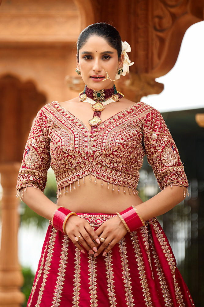 Meher-e-Riwaaz Wine Red Bridal Lehenga with Intricate Golden Embroidery