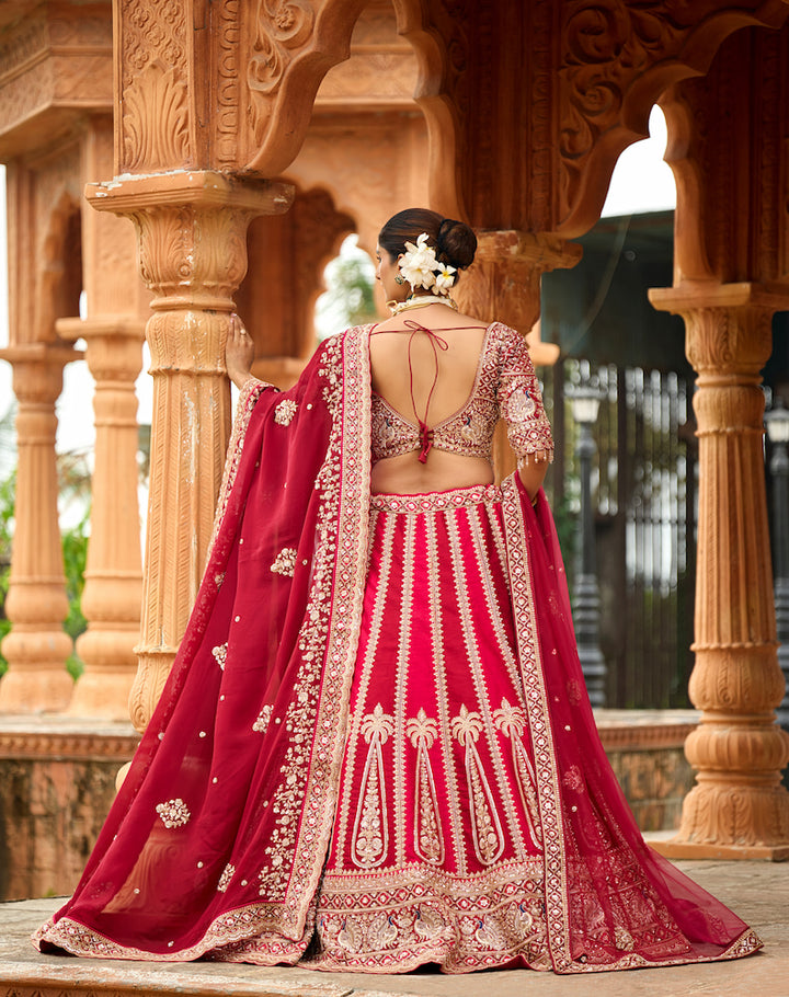 Meher-e-Riwaaz Wine Red Bridal Lehenga with Intricate Golden Embroidery