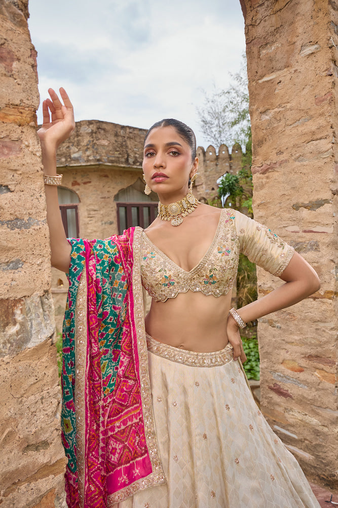 Ivory Cream Floral Lehenga Choli with Multicolour Embroidery and Pink Turquoise Dupatta