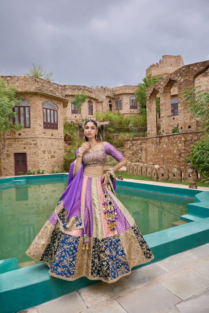 Purple and Multicolour Lehenga Choli with Patchwork Panels and Golden Embroidery