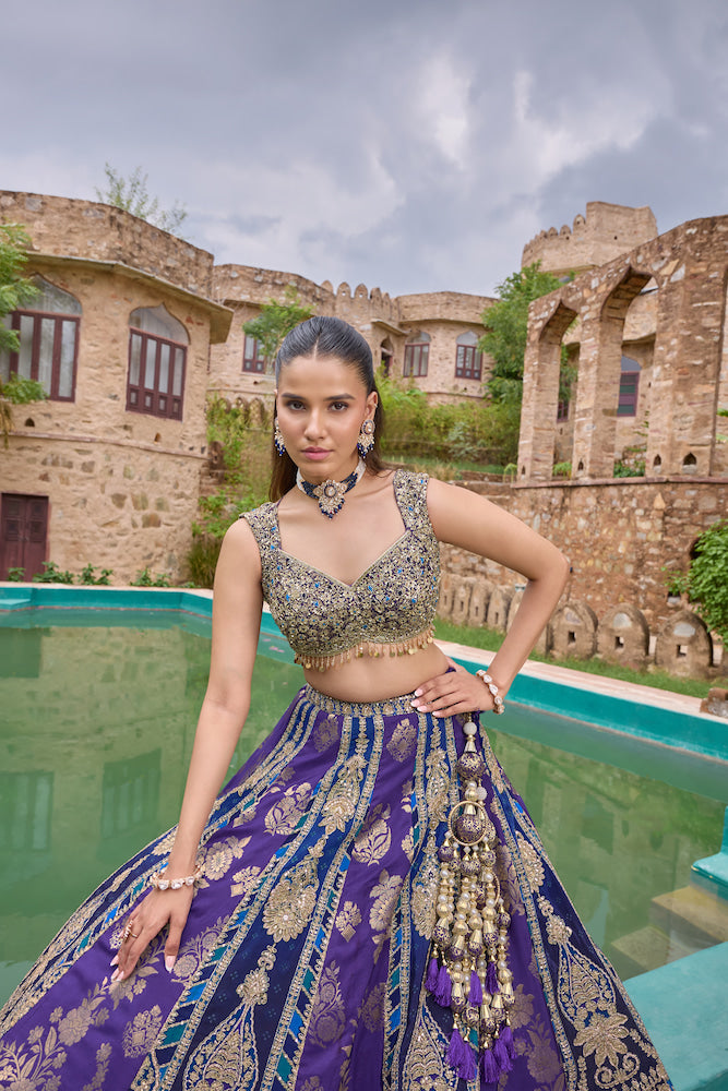 Royal Purple Lehenga Choli with Intricate Golden Embroidery and Designer Dupatta