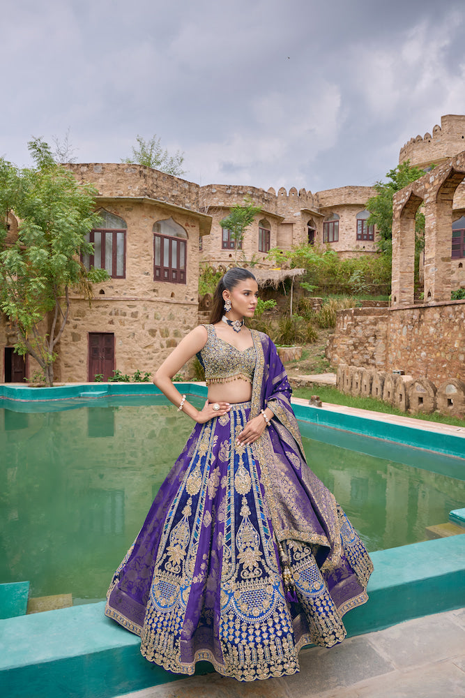 Royal Purple Lehenga Choli with Intricate Golden Embroidery and Designer Dupatta