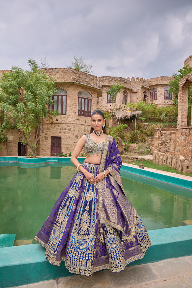Royal Purple Lehenga Choli with Intricate Golden Embroidery and Designer Dupatta