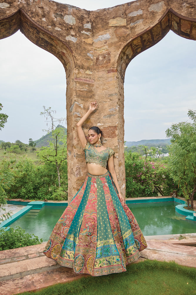 Teal Blue and Coral Pink Lehenga Choli with Multicolour Embroidery and Golden Borders