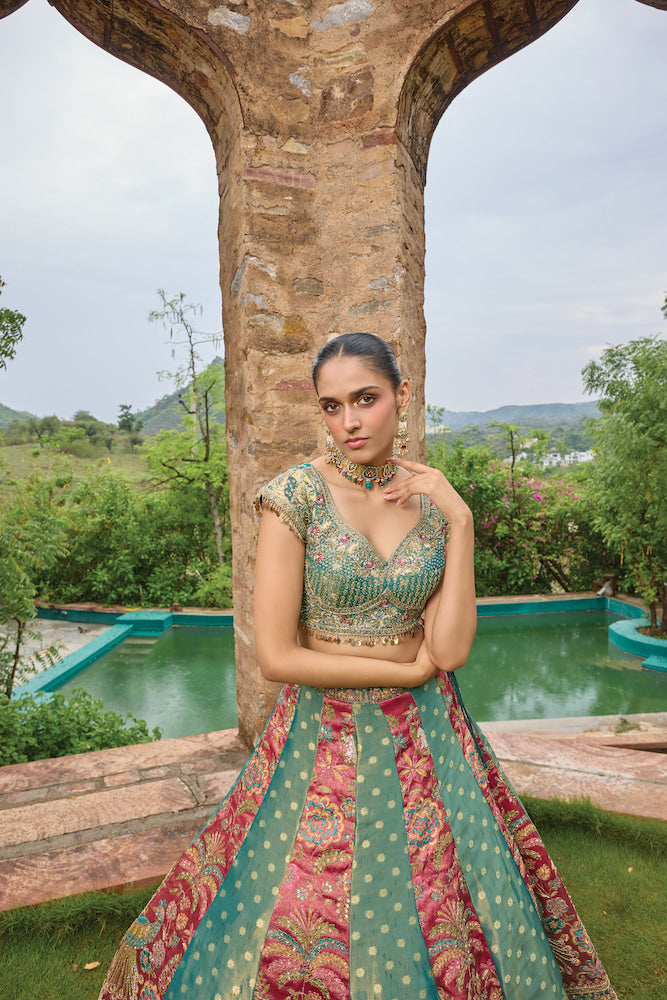 Teal Blue and Coral Pink Lehenga Choli with Multicolour Embroidery and Golden Borders