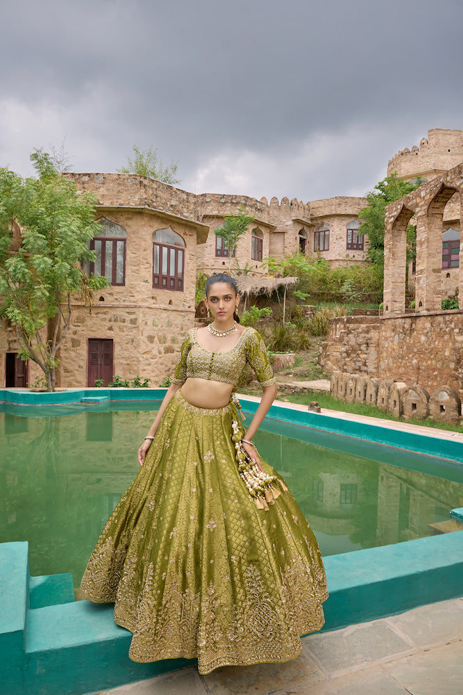 Olive Green Designer Lehenga Choli with Intricate Golden Embroidery and Traditional Motifs