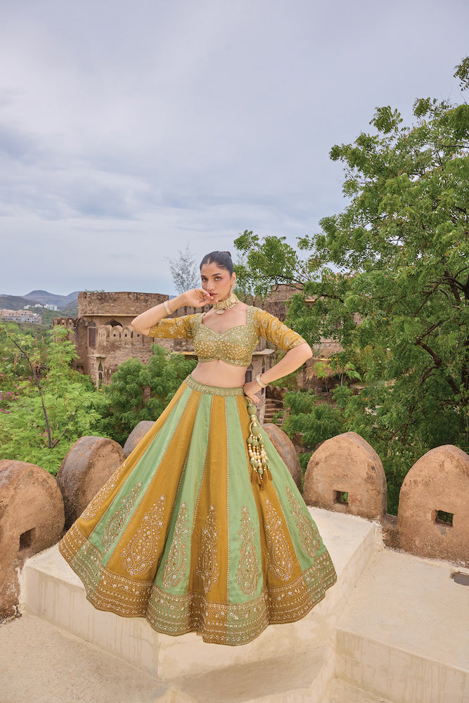 Mustard Yellow and Mint Green Lehenga Choli with Golden Embroidery and Panel Detailing