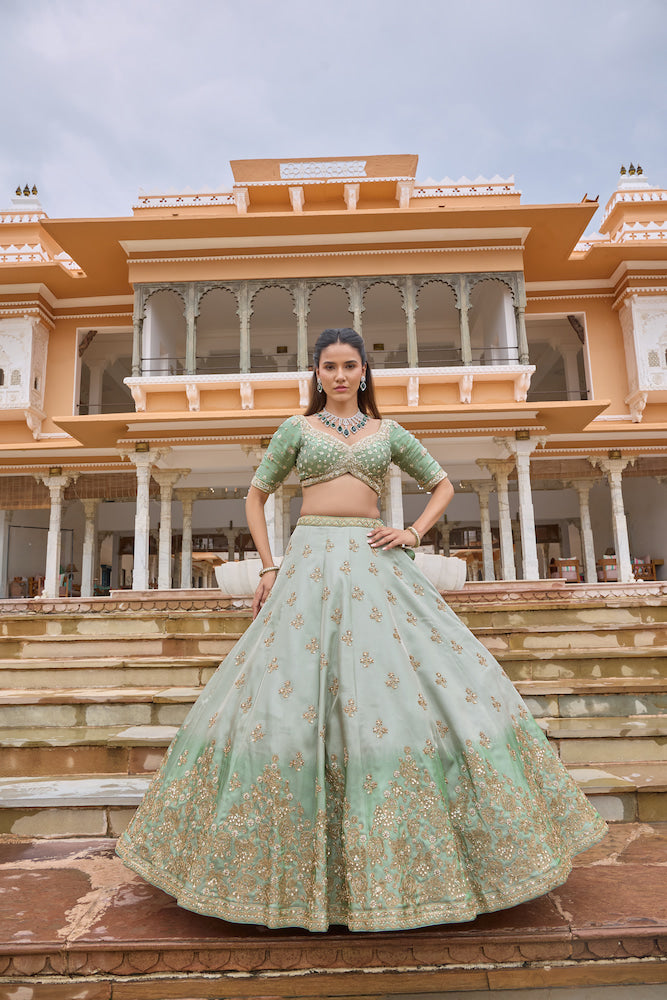 Pastel Mint Green Lehenga Choli with Golden Floral Embroidery and Flared Skirt