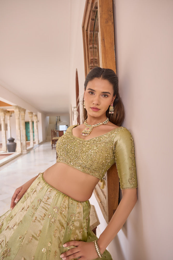 Sage Green Lehenga Choli with Golden Embroidery and Elegant Dupatta