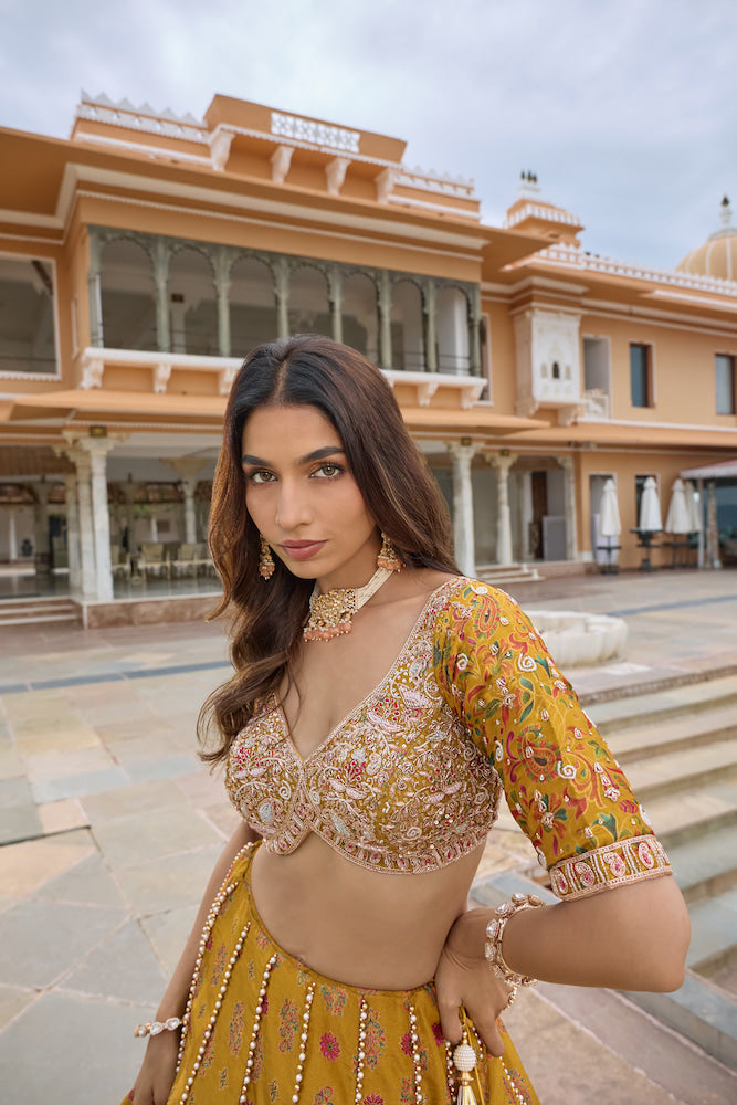Mustard Yellow Embroidered Lehenga Choli Set with Gold Sequin Work and Intricate Floral Border