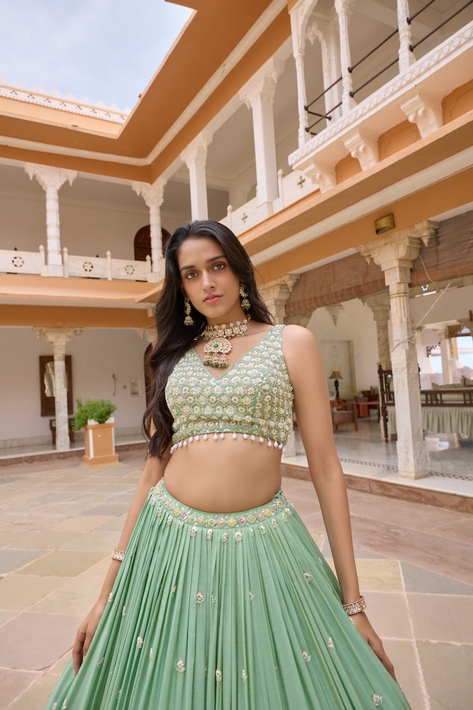 Pastel Mint Green Lehenga Choli Set with Intricate Multicolour Embroidery
