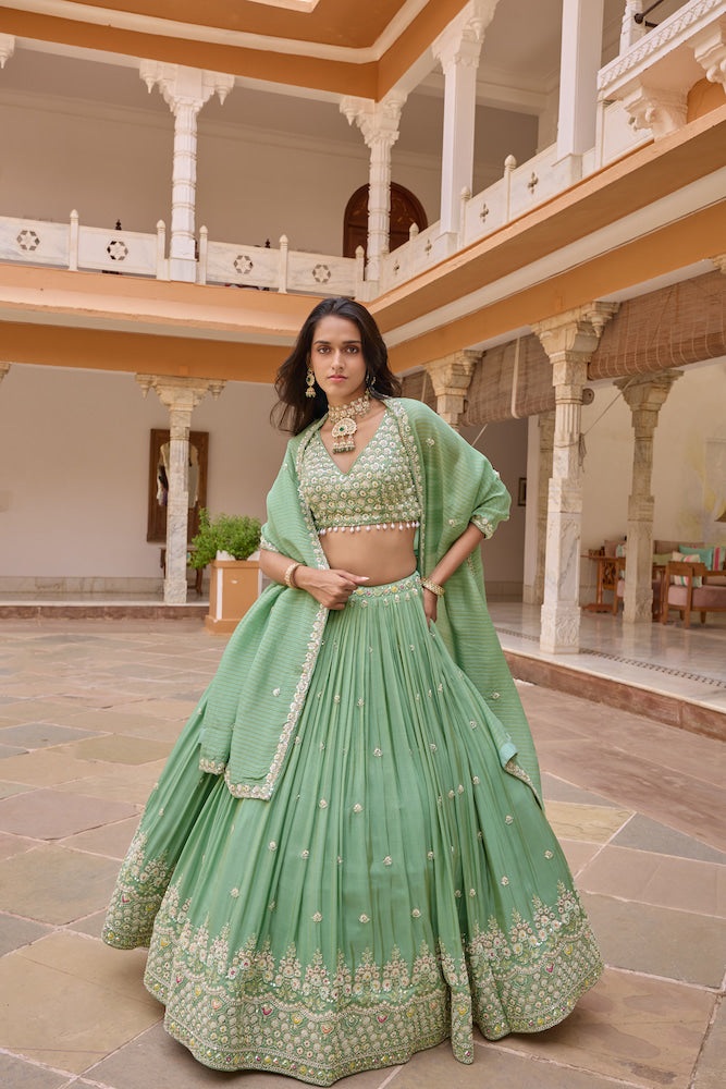 Pastel Mint Green Lehenga Choli Set with Intricate Multicolour Embroidery