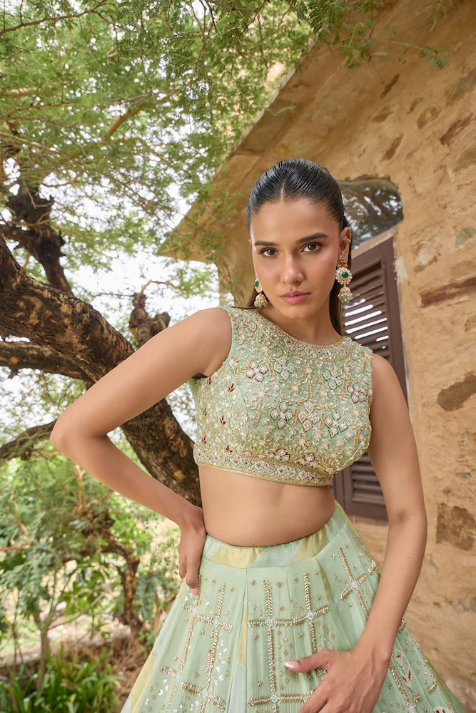 Mint Green Lehenga Choli with Red Printed Dupatta and Intricate Embroidered Border