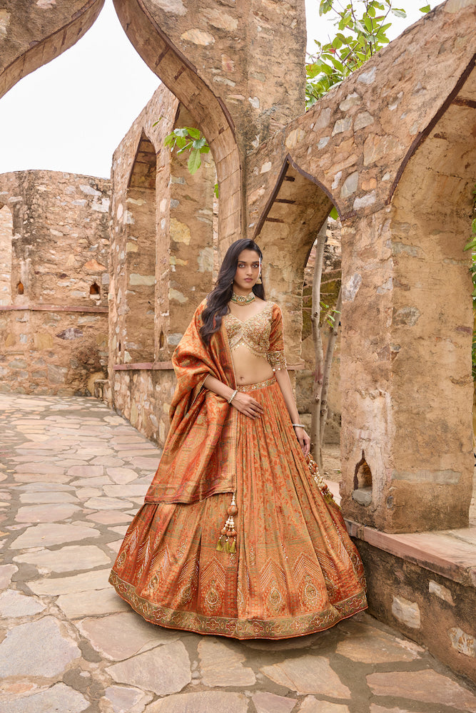 Rust Orange Lehenga Choli with Golden Embroidery and Matching Dupatta