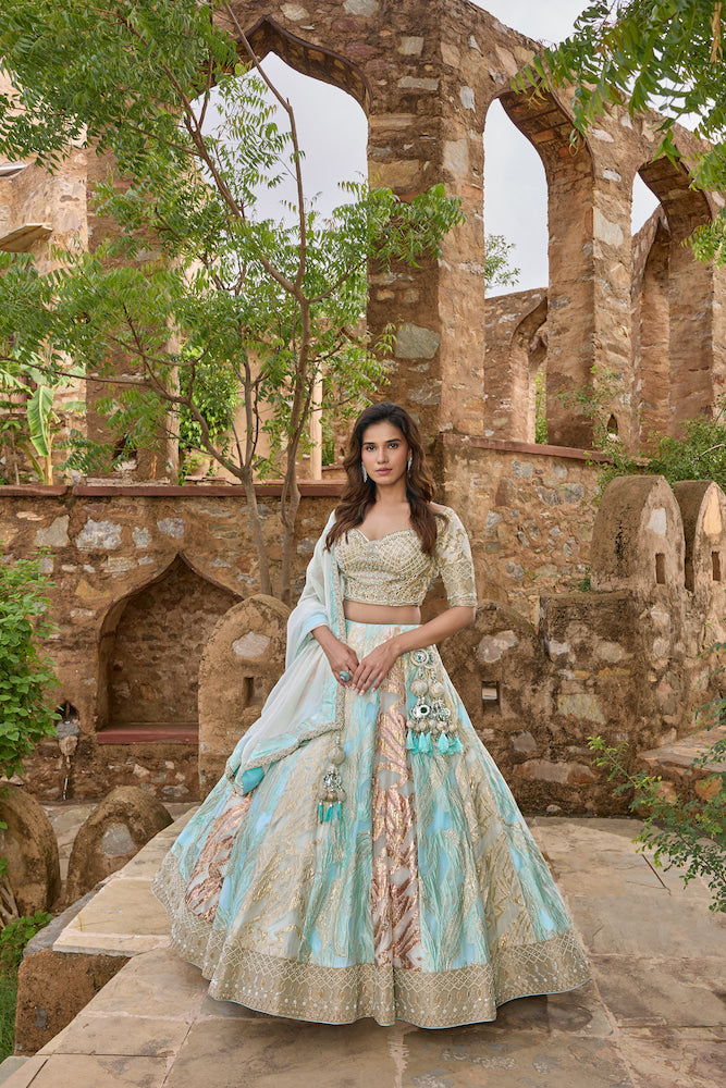 Sky Blue and Ivory Lehenga Choli with Multicolour Panels and Golden Embroidered Border