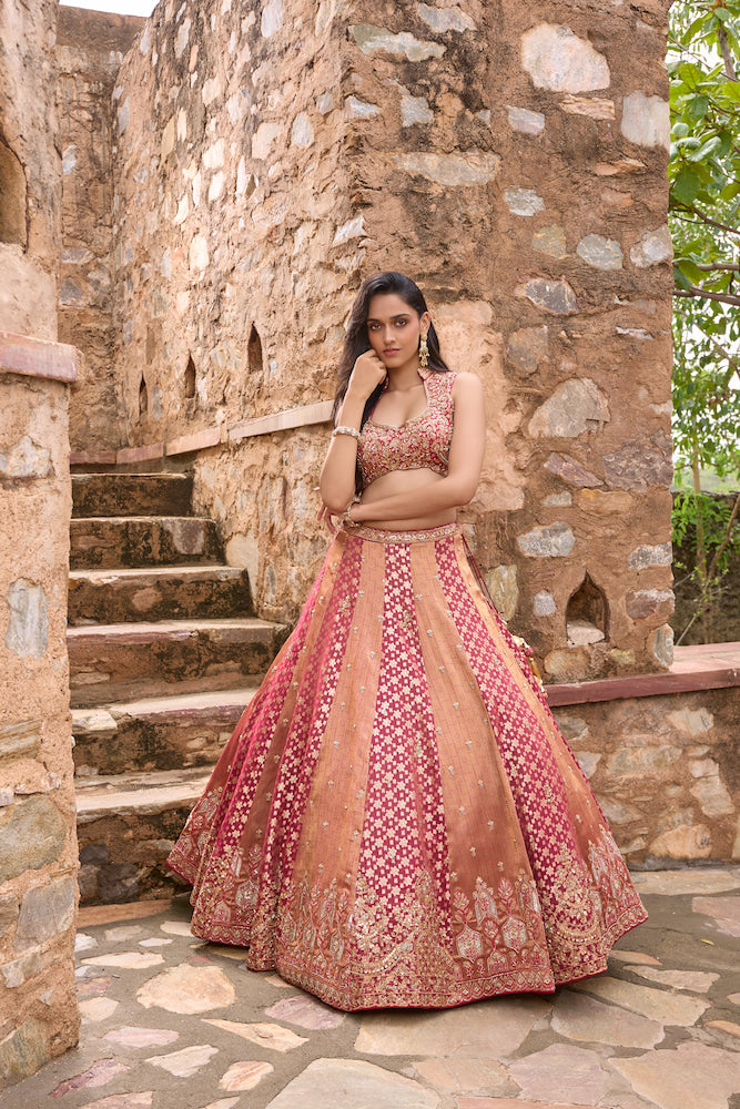 Peach and Rani Pink Lehenga Choli with Intricate Golden Embroidery