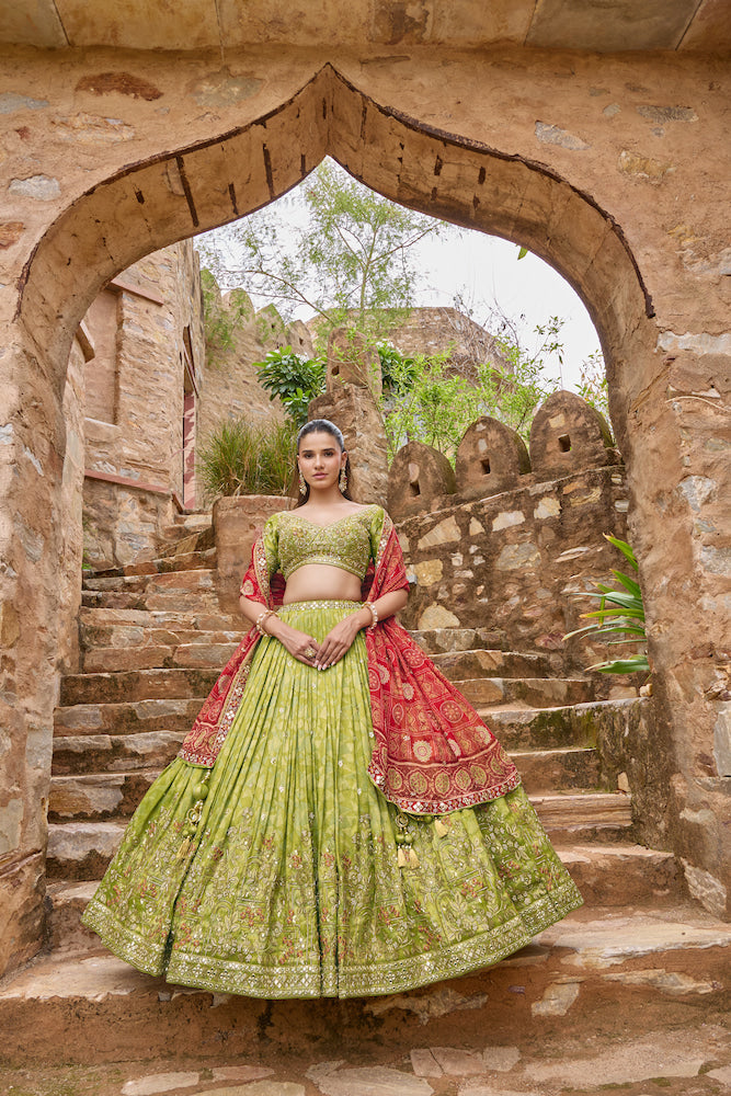 Lime Green Lehenga Choli with Red Dupatta and Intricate Golden Embroidery