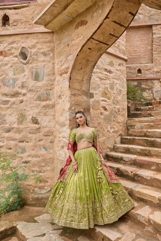 Lime Green Lehenga Choli with Red Dupatta and Intricate Golden Embroidery