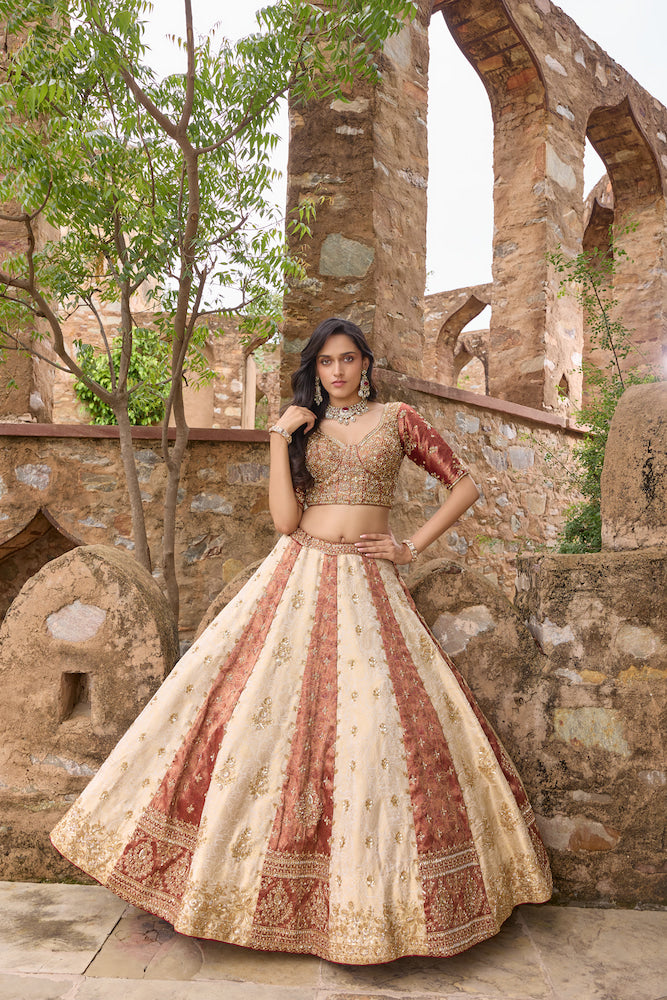 Ivory and Maroon Designer Lehenga Choli with Multicolour Embroidered Panels
