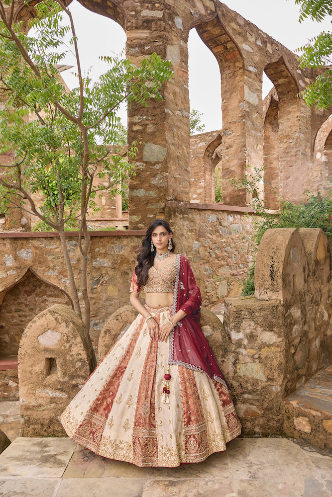 Ivory and Maroon Designer Lehenga Choli with Multicolour Embroidered Panels