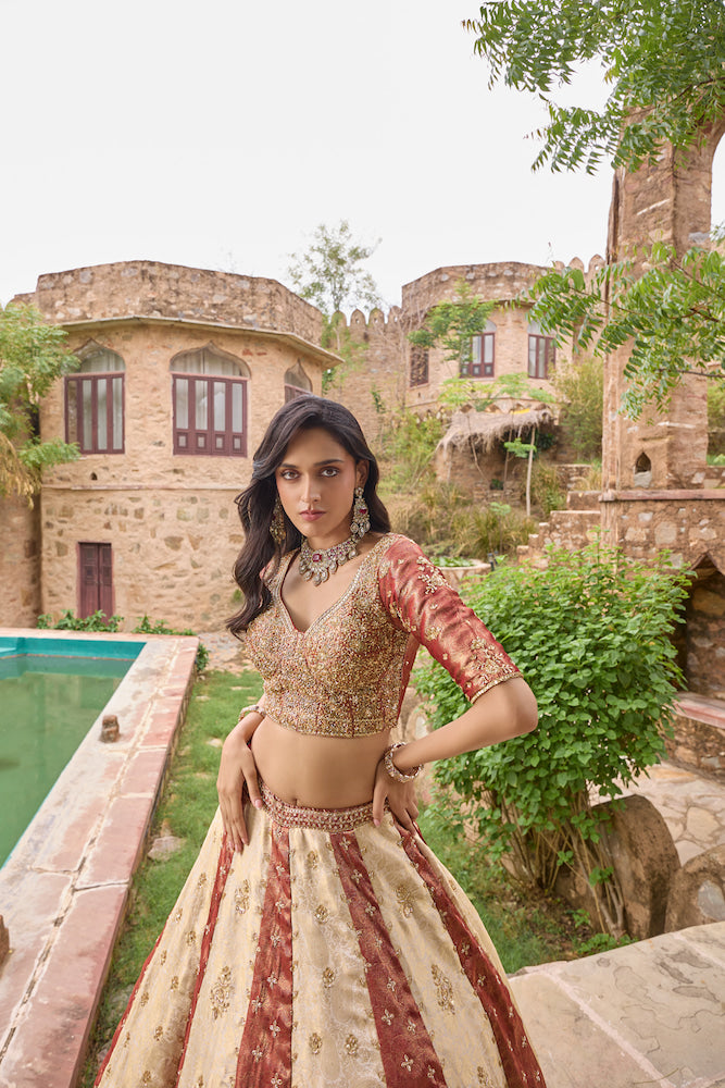 Ivory and Maroon Designer Lehenga Choli with Multicolour Embroidered Panels