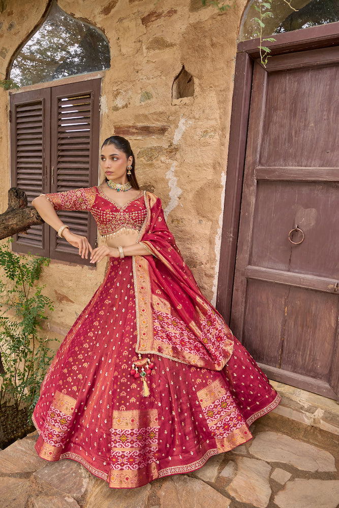 Deep Magenta Lehenga Choli with Golden Embroidery and Matching Dupatta